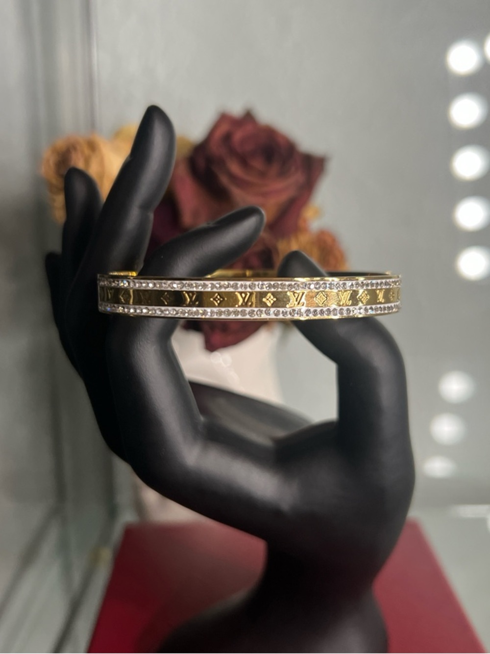 Gold bangle with mini stones